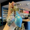 ⁦Electroplated Colorful Acrylic Conch Keychain for Girl's Bag, Car Pendant, Model Decoration, Home Furnishings, Wholesale⁩ - الصورة ⁦3⁩