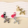 ⁦Cute Cartoon Y2K Style Balloon Dog Keychains Acrylic Couple Car Key Chains Girl's Book Bag Satchel Pendant Jewelry Accessories⁩ - الصورة ⁦3⁩