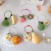 ⁦New Woolen Knitted Keychain Cute Cartoon Fruit Vegetable Keyring Creative Car Key Ring Charm Bag Pendant Women Girl's Gifts⁩ - الصورة ⁦2⁩